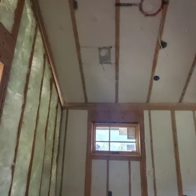 BLOWN IN BLANKET FIBER GLASS INSULATION