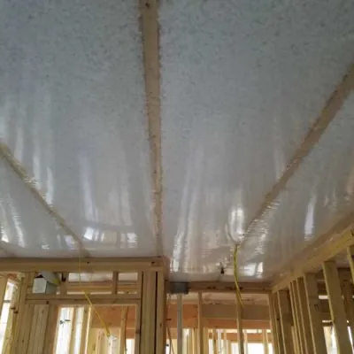 BLOWN IN BLANKET FIBER GLASS INSULATION