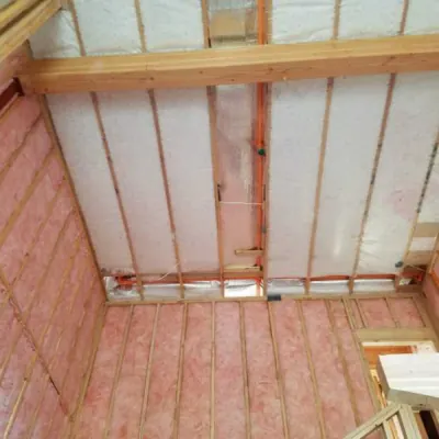 BLOWN IN BLANKET FIBER GLASS INSULATION